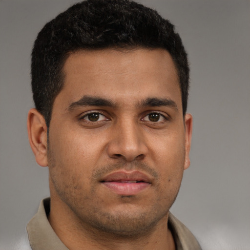 Neutral white young-adult male with short  brown hair and brown eyes