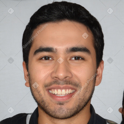 Joyful latino young-adult male with short  black hair and brown eyes