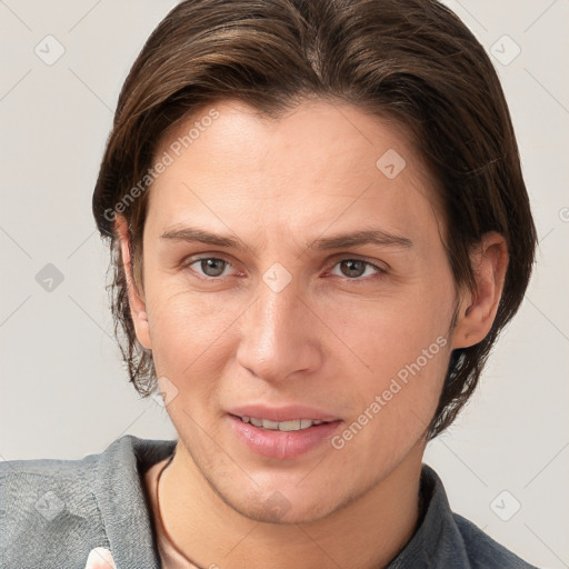 Joyful white young-adult female with short  brown hair and grey eyes