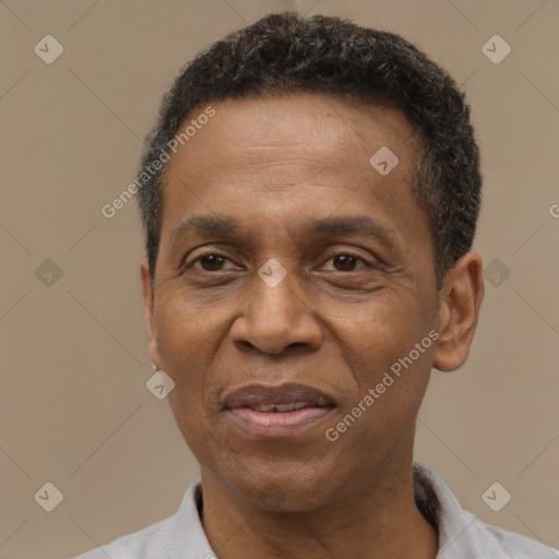 Joyful latino adult male with short  black hair and brown eyes