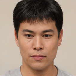 Neutral asian young-adult male with short  brown hair and brown eyes