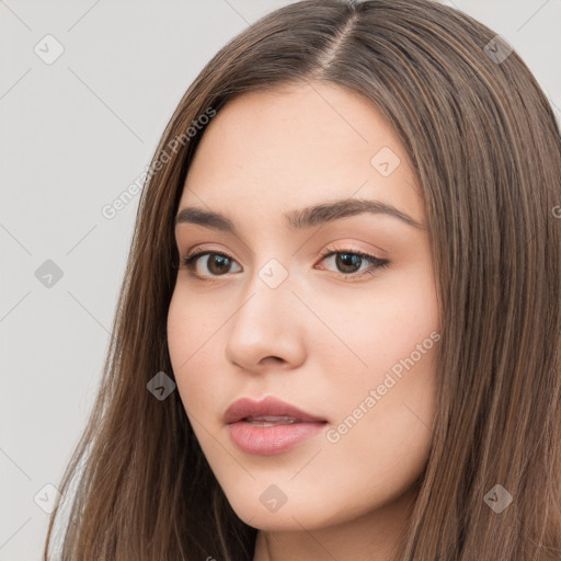 Neutral white young-adult female with long  brown hair and brown eyes