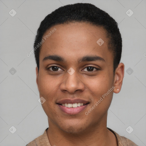 Joyful black young-adult male with short  black hair and brown eyes