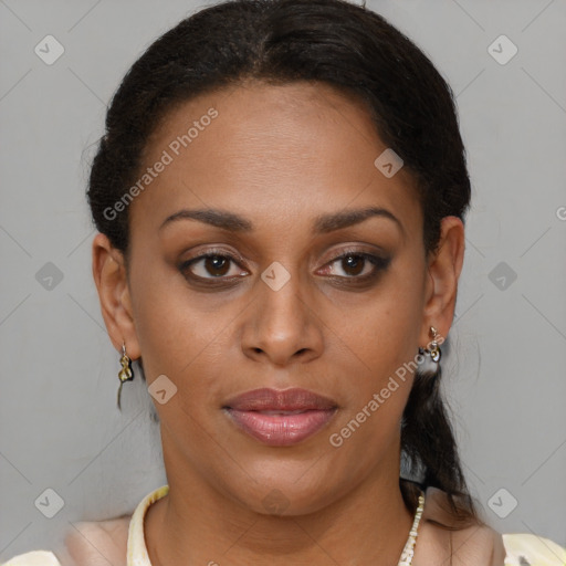 Joyful latino young-adult female with short  brown hair and brown eyes