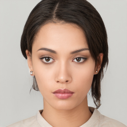 Neutral white young-adult female with medium  black hair and brown eyes