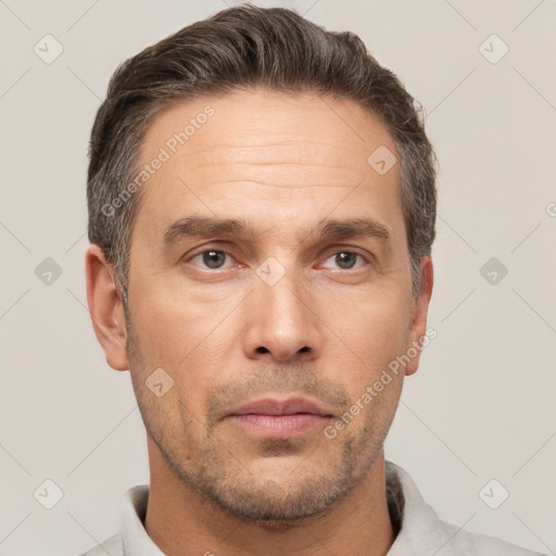 Neutral white adult male with short  brown hair and brown eyes