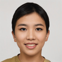 Joyful asian young-adult female with short  black hair and brown eyes