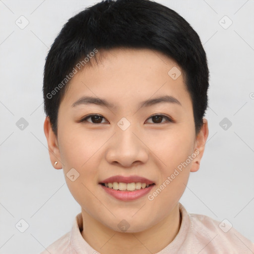 Joyful asian young-adult female with short  black hair and brown eyes