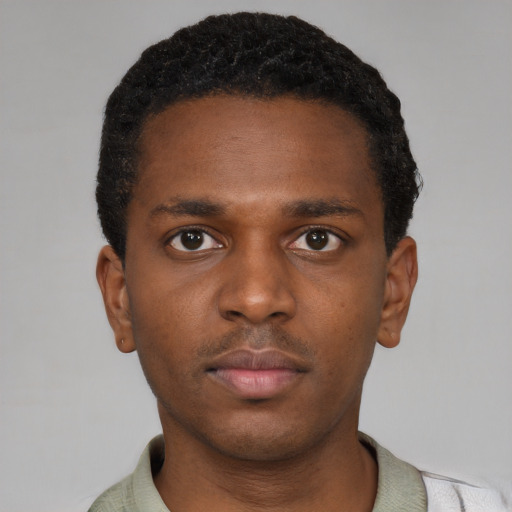 Neutral latino young-adult male with short  brown hair and brown eyes