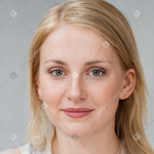 Joyful white young-adult female with medium  brown hair and blue eyes