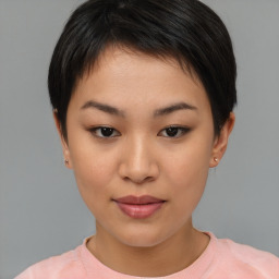 Joyful asian young-adult female with short  brown hair and brown eyes