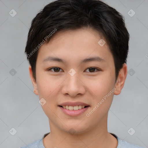 Joyful asian young-adult female with short  brown hair and brown eyes