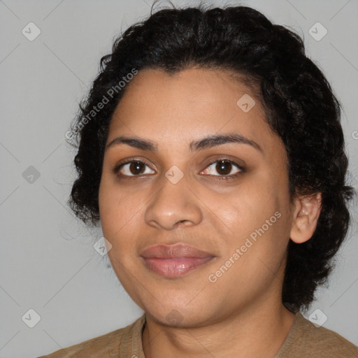 Joyful latino young-adult female with medium  black hair and brown eyes