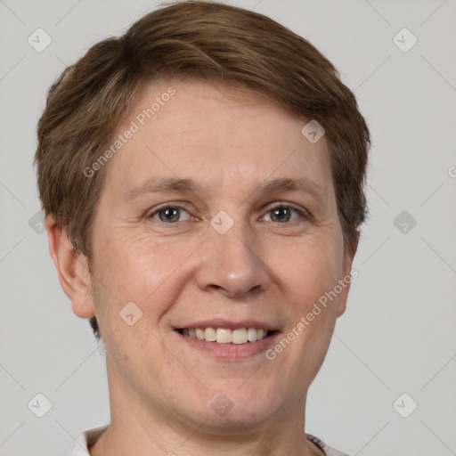 Joyful white adult male with short  brown hair and grey eyes