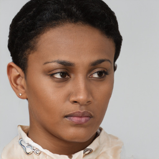 Neutral black young-adult female with short  brown hair and brown eyes