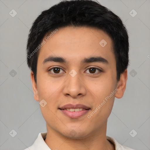 Joyful latino young-adult male with short  black hair and brown eyes