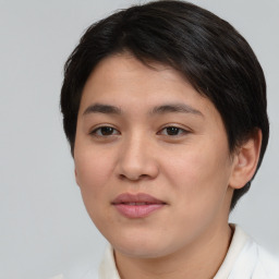 Joyful asian young-adult female with short  brown hair and brown eyes