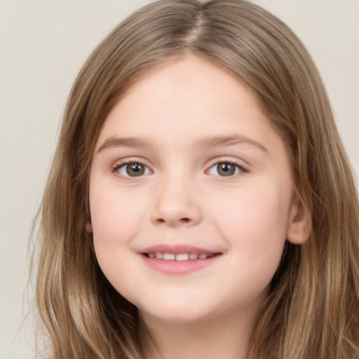 Joyful white child female with long  brown hair and brown eyes