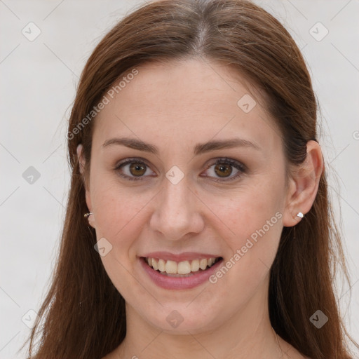 Joyful white young-adult female with long  brown hair and grey eyes