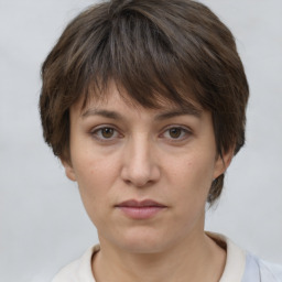 Neutral white young-adult female with short  brown hair and brown eyes