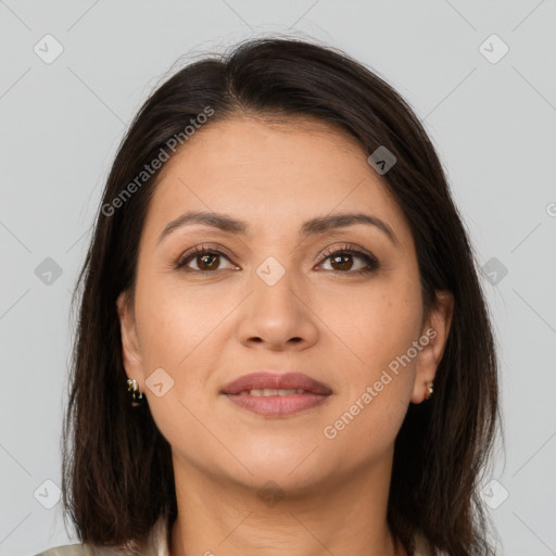 Joyful latino young-adult female with medium  brown hair and brown eyes