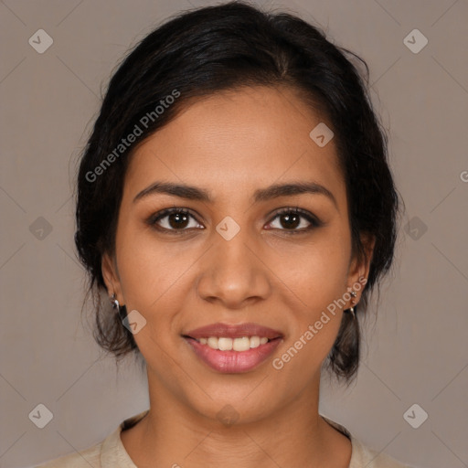 Joyful latino young-adult female with medium  brown hair and brown eyes