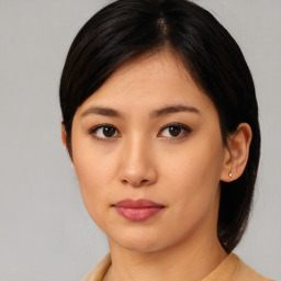 Neutral asian young-adult female with medium  brown hair and brown eyes