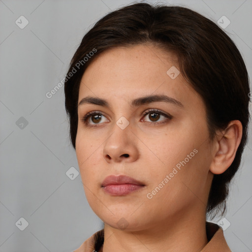 Neutral white young-adult female with medium  brown hair and brown eyes