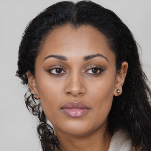 Neutral latino young-adult female with long  black hair and brown eyes