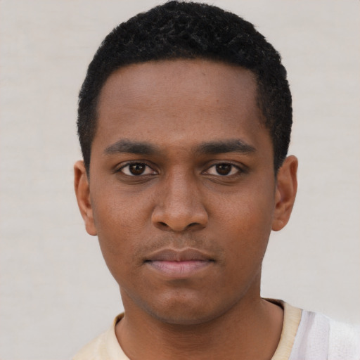 Neutral black young-adult male with short  black hair and brown eyes