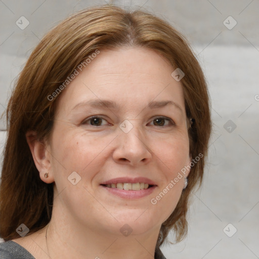 Joyful white adult female with medium  brown hair and brown eyes