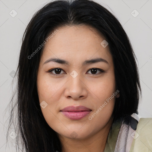 Joyful asian young-adult female with long  brown hair and brown eyes