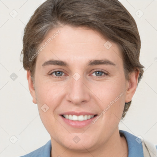 Joyful white young-adult female with short  brown hair and grey eyes