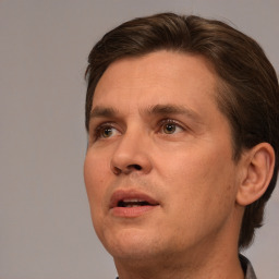 Neutral white adult male with short  brown hair and brown eyes