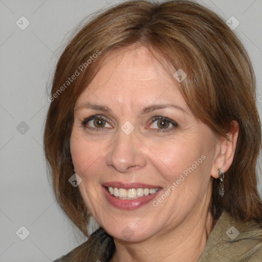 Joyful white adult female with medium  brown hair and brown eyes