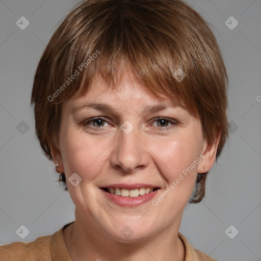 Joyful white adult female with medium  brown hair and grey eyes