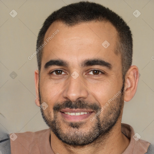 Joyful white adult male with short  black hair and brown eyes