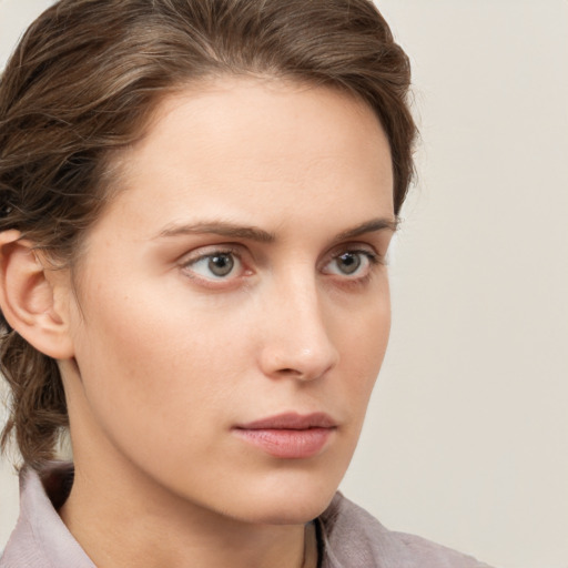 Neutral white young-adult female with medium  brown hair and grey eyes