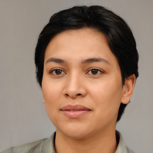 Joyful latino young-adult female with medium  black hair and brown eyes