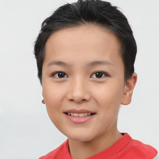 Joyful white child female with short  brown hair and brown eyes