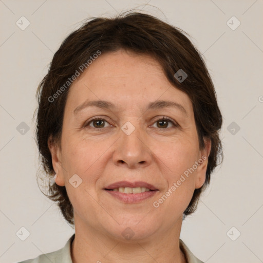 Joyful white adult female with medium  brown hair and grey eyes