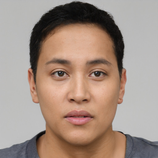 Neutral latino young-adult male with short  brown hair and brown eyes