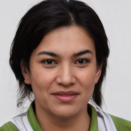 Joyful asian young-adult female with medium  brown hair and brown eyes