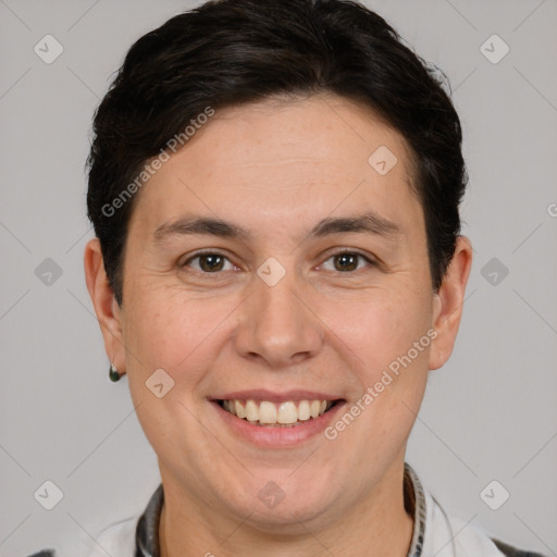 Joyful white adult female with short  brown hair and brown eyes