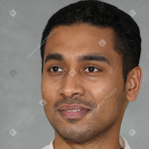 Joyful latino young-adult male with short  black hair and brown eyes