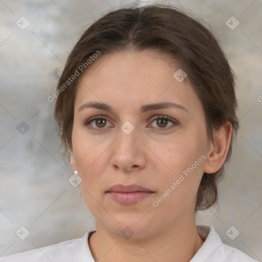 Neutral white young-adult female with medium  brown hair and brown eyes