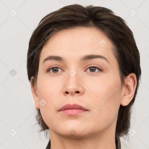 Neutral white young-adult female with medium  brown hair and brown eyes