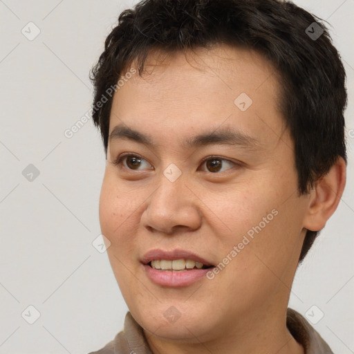 Joyful white young-adult male with short  brown hair and brown eyes