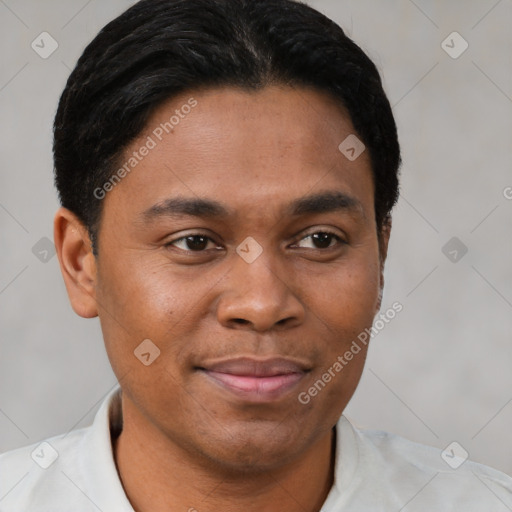 Joyful latino young-adult male with short  brown hair and brown eyes