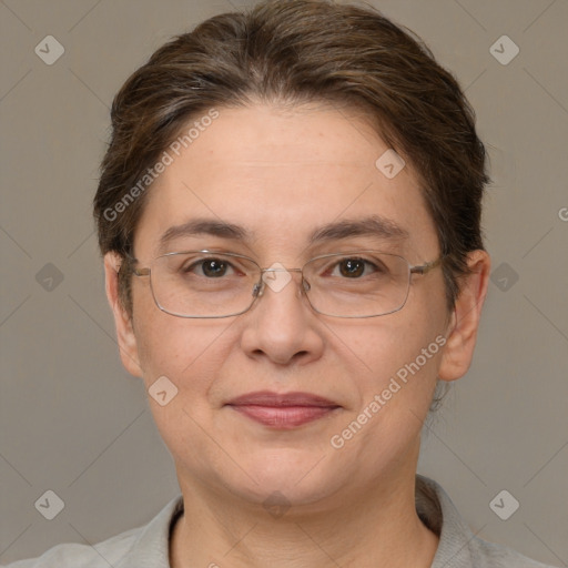 Joyful white adult female with short  brown hair and brown eyes